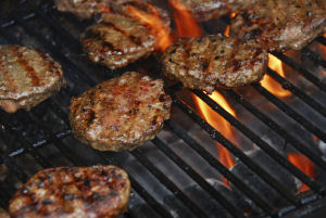 POLLUTING BURGERS | Few grilling methods appear to match charcoal's release of soot and other tiny particles into the air. Credit: iStockphoto