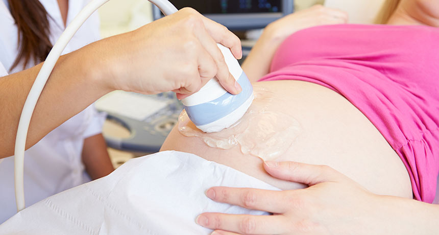 pregnant woman having ultrasound