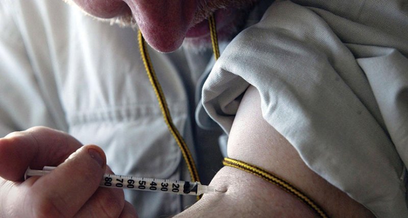 a person shooting up