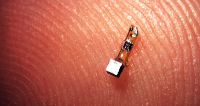 tiny crystal on a fingertip