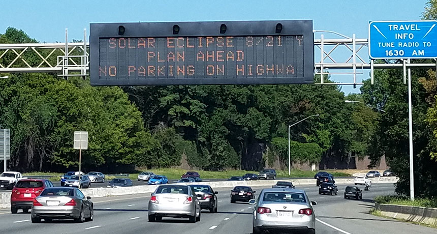 highway sign about eclipse