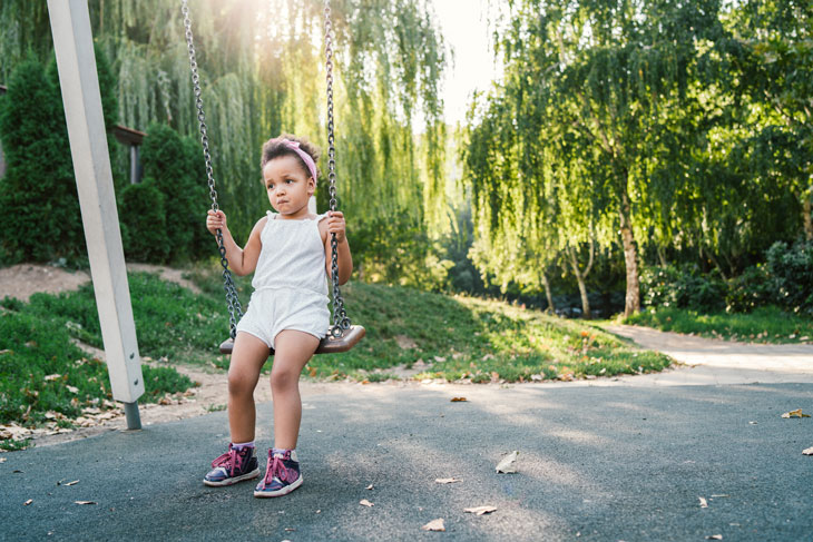 child on swing