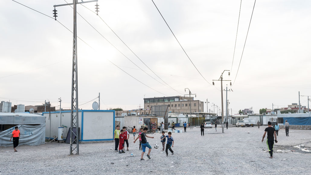 children playing soccer in Iraq