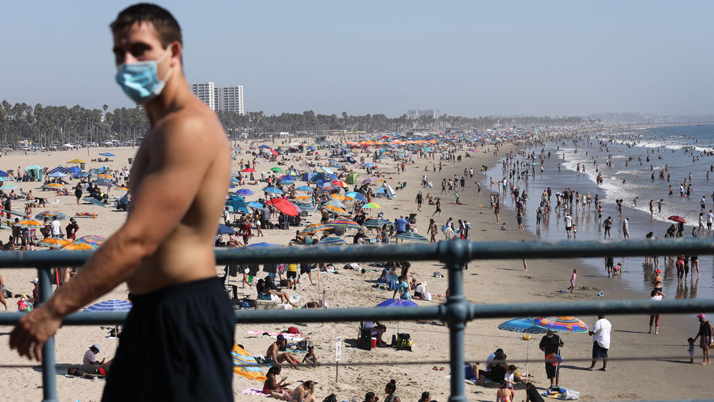 man wearing mask at Santa Monica beach